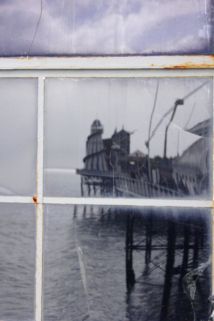 Reflected old pier